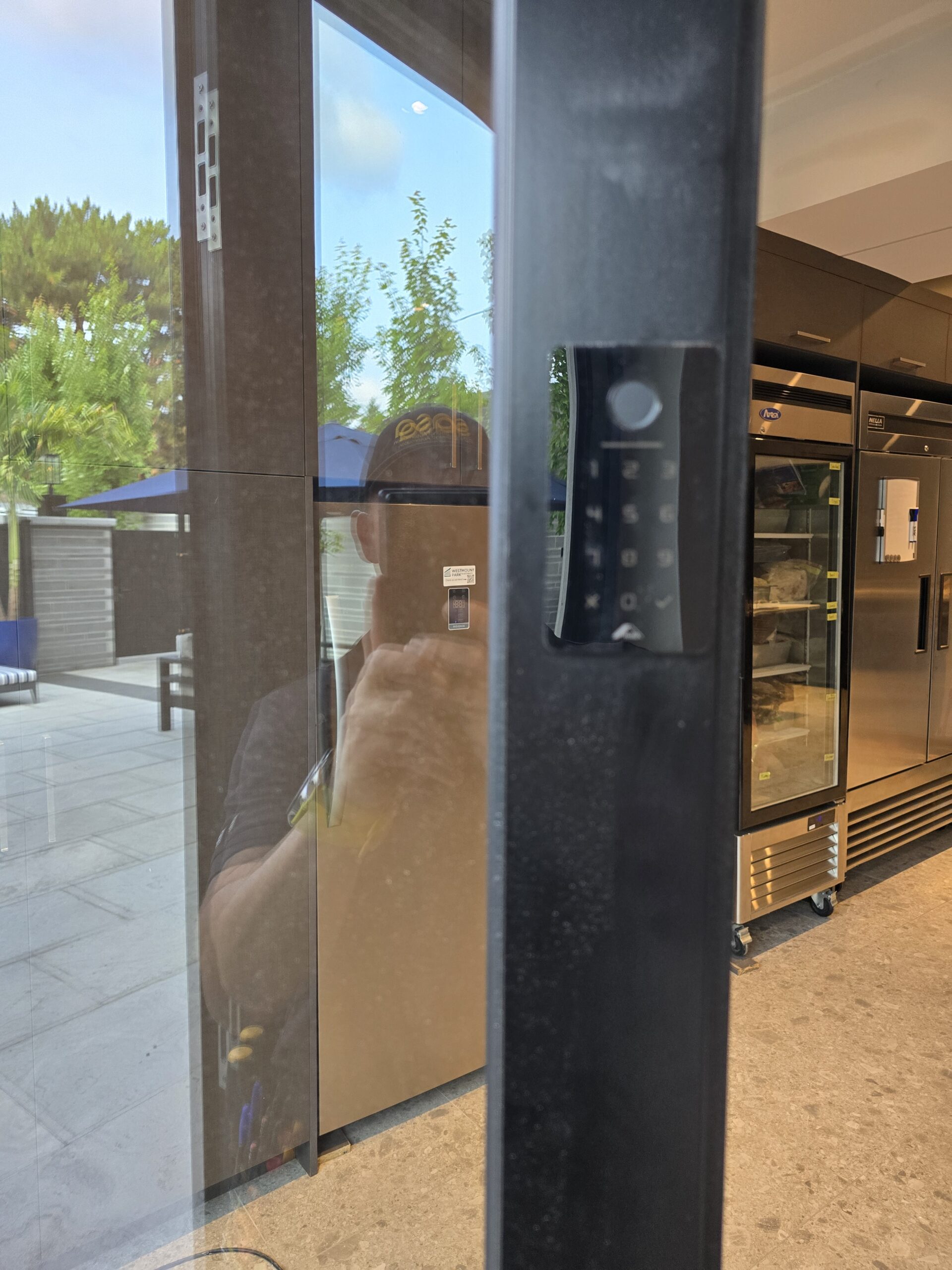 SASA technician reworking a door automation plan after a last-minute design change